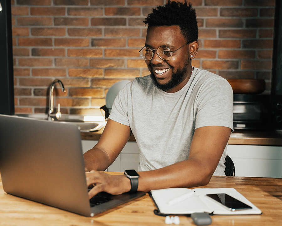 software developer in front of his laptop